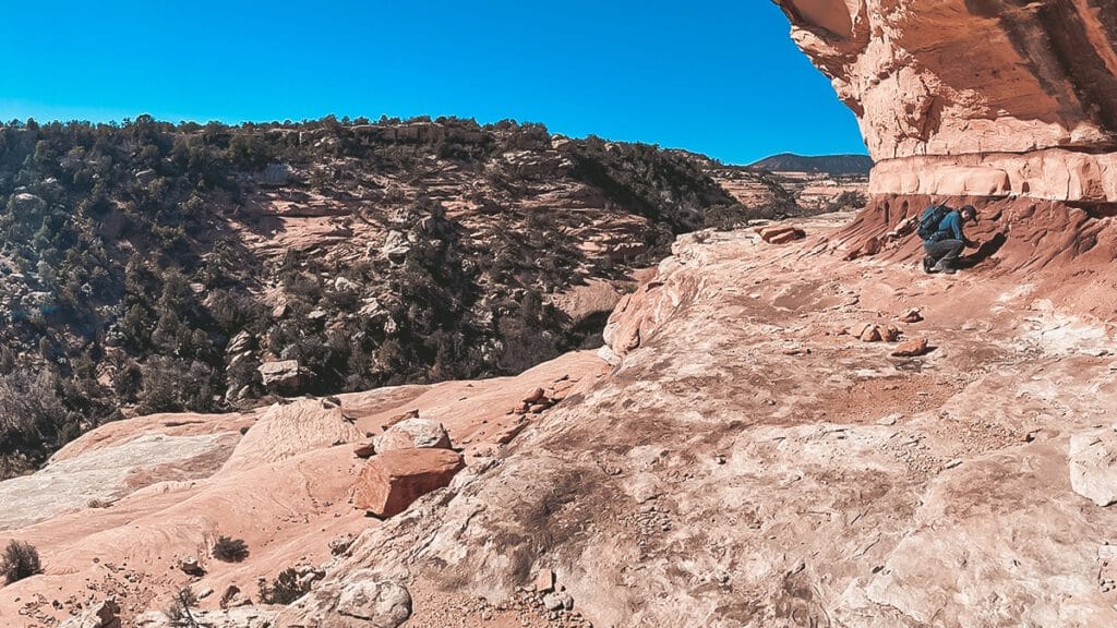 Collecting a sample of dirt in Utah